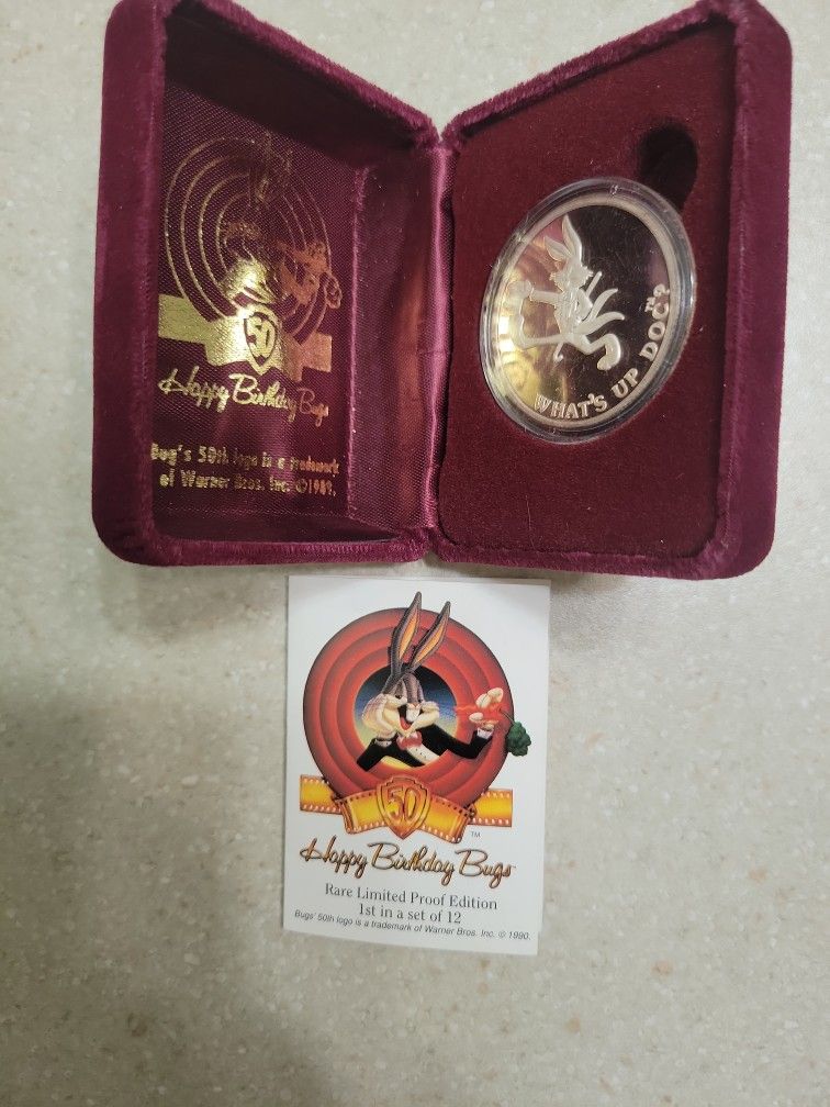 1990 Bugs Bunny 50th Anniversary 1 Oz Proof Silver Coin.  Comes with Original Box and COA 