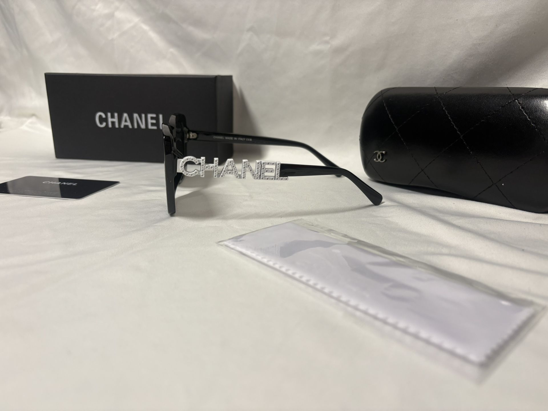 Black Frames, White Lettering, Chanel Sunglasses
