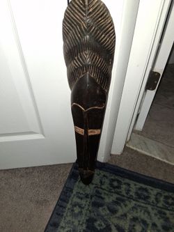 African Carved Wooden Tribal Mask 27" H. 9" W at the top 2" at the bottom Pickup only cash