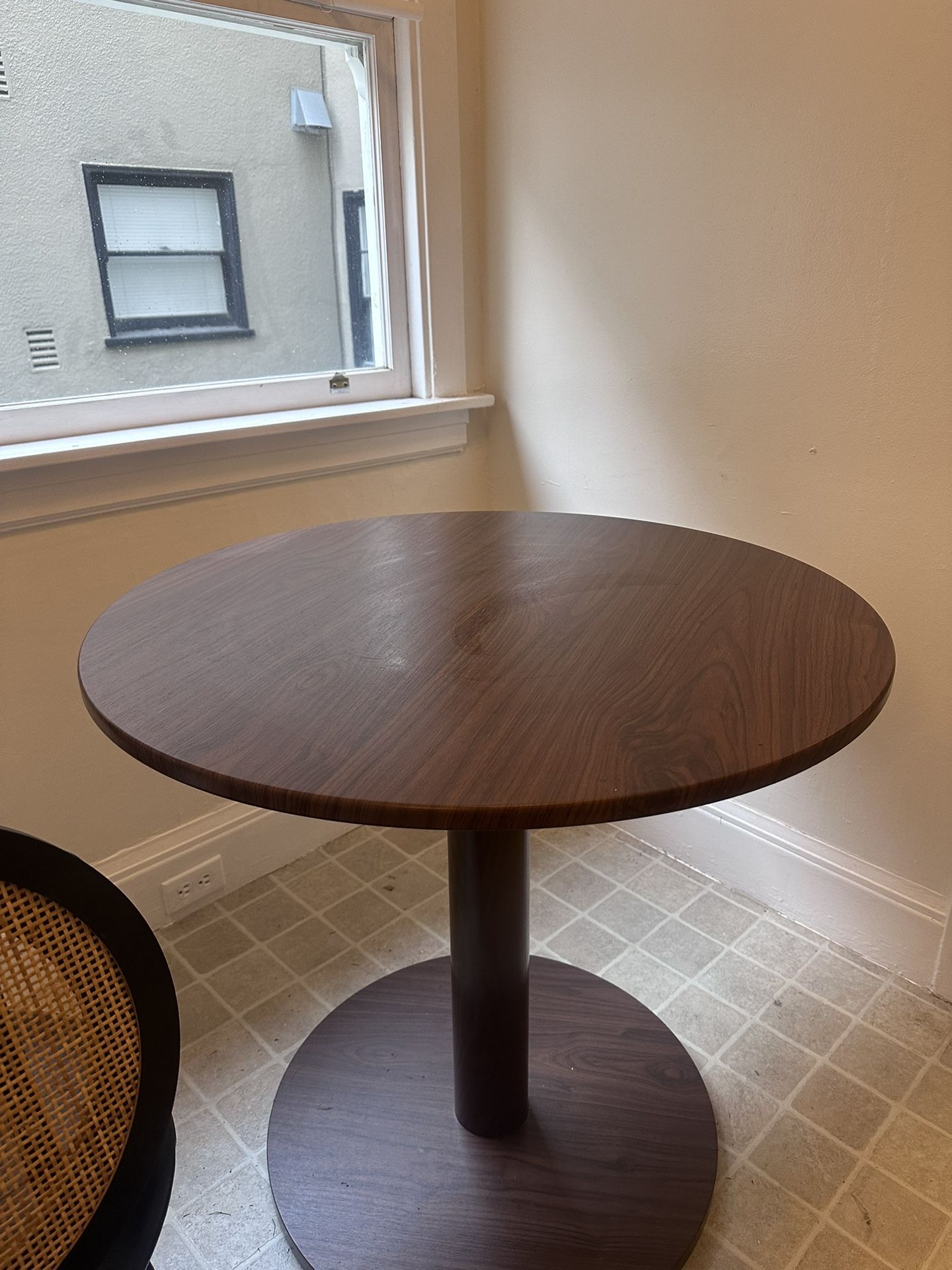 Small brown dining table for 2-3 people
