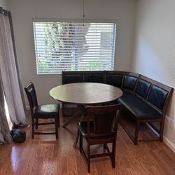 Round Brown Table + Bench Seating