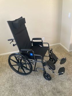 Wheelchair New with Elevating Footrests