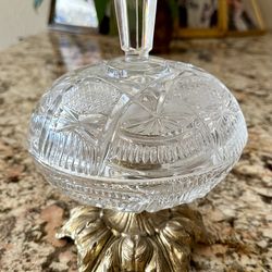 Vintage Hollywood Regency cut crystal lidded compote or candy dish set on an ornate gold-plated metal base