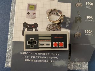 Brand new Nintendo Museum Mystery Box Nintendo Entertainment System NES Controller Keychain
