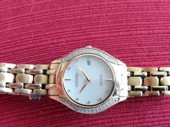 Ladies Eco Drive Watch With Calendar, Gold Tone , Mother Of Pearl Face, With Crystals Working