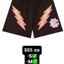 Black + pink Eric Emanuel lightning bolt shorts