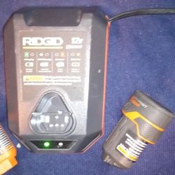 Ridgid Battery Charger And Two Charges Battery