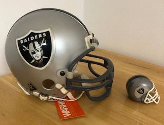 Raiders football clothing, riddell helmet and bobble head
