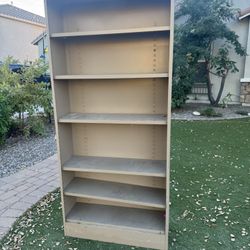 tan metal shelving unit