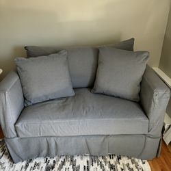 Crate & Barrel loveseat couch with air mattress pullout