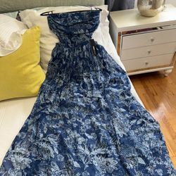 Fashion Nova Strapless   Maxi dress Size Medium , Elastic at the waist and back. And the skirt part has two openings in the front, new with tags.