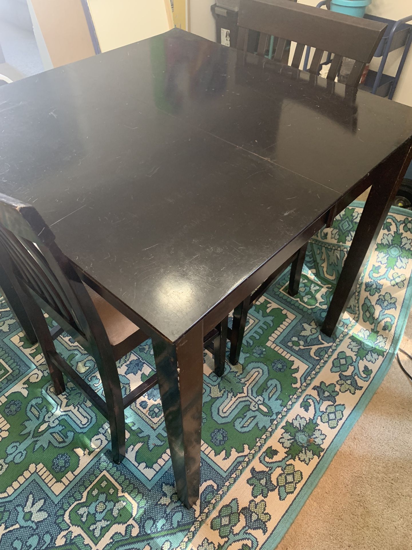 3 ft x 3 ft dining table with 1.5 ft extension; 3 ft tall; 4 chairs