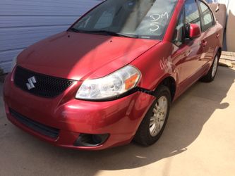 Suzuki SX4 parting out for parts engine transmission door fender rim wheel low miles