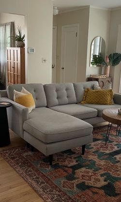 Grey Couch with reversible Chaise