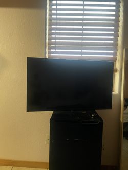 Tv And Mini Fridge 