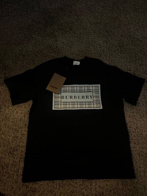 Size small black burberry shirt 100% authentic serious buyers only