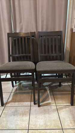 6 brown upholstered folding chairs