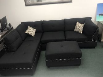 New black sofa sectional with studs