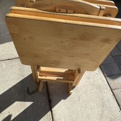 A Set Of Portable Tables With Stand