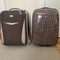 (2) CARRY ON REGULATION SIZE SUITCASES 