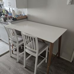 Ikea dinning table with two chairs