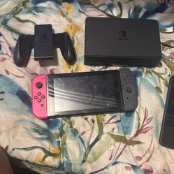 nintendo switch with doc and controller 