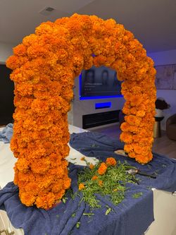 Dia de los muertos arch with real marigolds