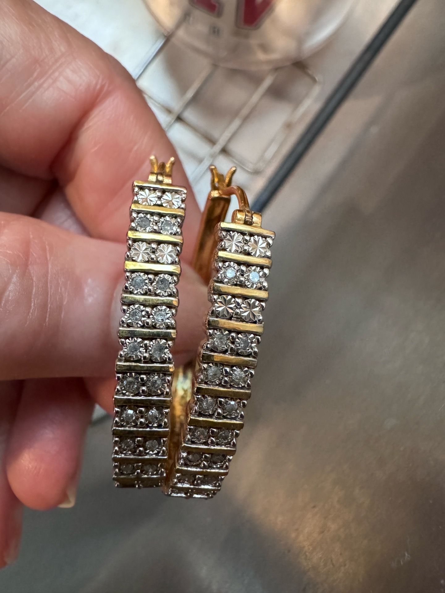 Diamond earrings 1/2 k total. Gold plated over sterling silver.