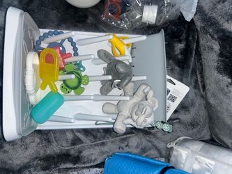 Assorted Pacifiers and Teething Toys with Tree Stand