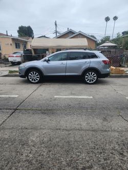 Limpio ,Mazda cx9 2014 con 103,000 millas