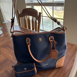 Dooney&Bourke turn lock tote bag with matching coin pouch. 