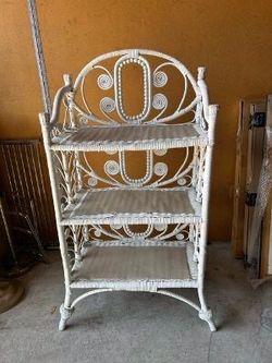 White wicker stand three shelf