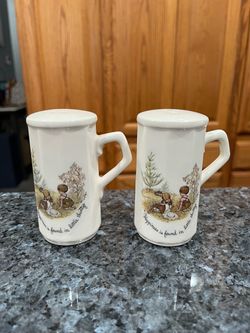 Vintage Holly Hobbit Happiness Is Found In The Little Things Pair of Salt & Pepper Shakers.  Size approximately 3 3/4 inches tall.  Preowned the botto