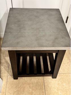 Solid wood end table with industrial look top