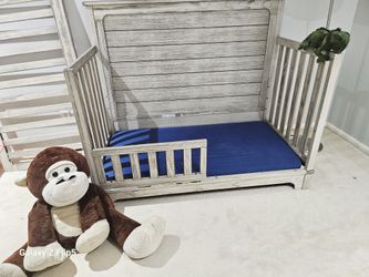 Gorgeous Convertible Crib includes Infant and Toddler guard rails