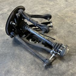 BMW 335i 328i DRIVER REAR WHEEL HUB CARRIER W/ OUTPUT SHAFT