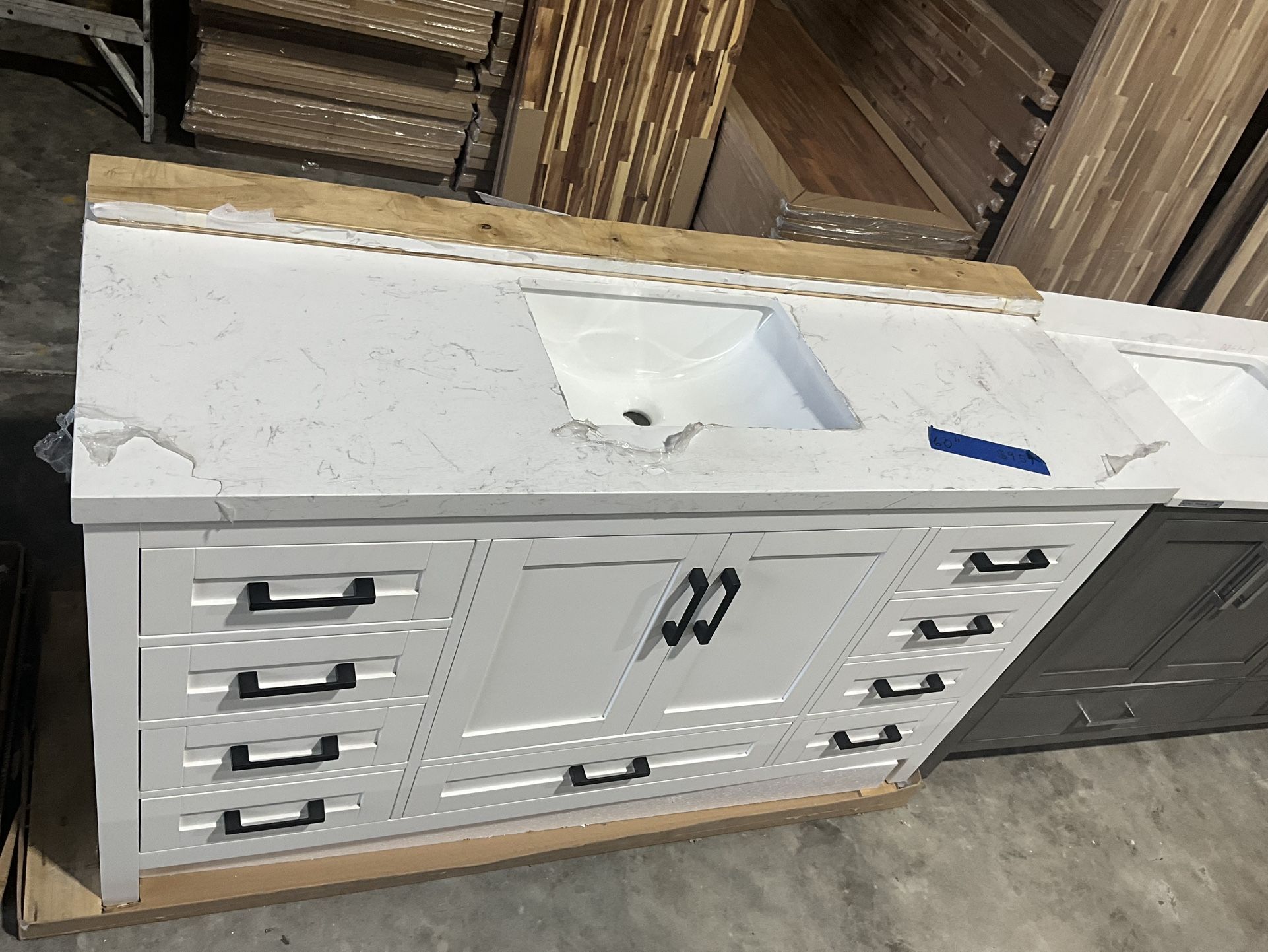 60” Bathroom Vanity in white , single sink soft close solid wood with vanity top in white $959 Luke’s liquidations warehouse Address: 2434 N Forsyt