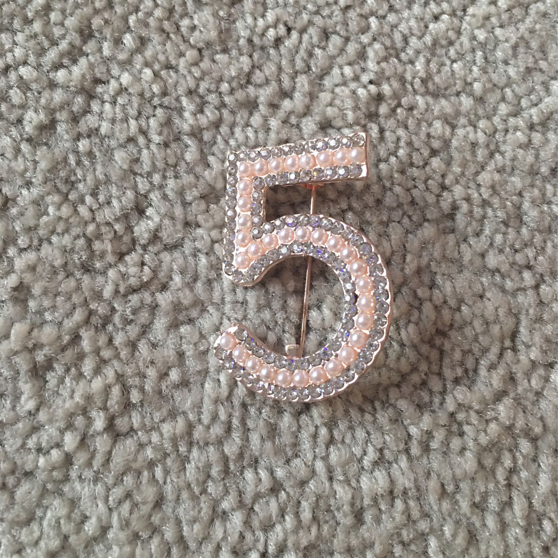 Hey Chanel number five brooch