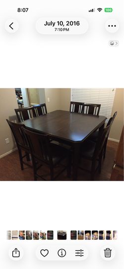 Dark wood high top table & 8 chairs