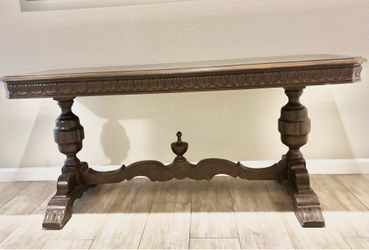 Ornate dark wood trestle console table