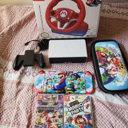 2020 V2 Nintendo Switch Unpatched & All Mario Custom with 2 Expensive Games, Mario case. Mario wheel & Pedels. $330. & i don't sell to crackheads FIRM