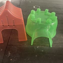 Two hamster enclosure toys