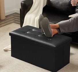 Black storage ottoman