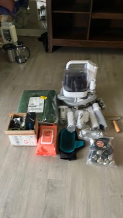 Dog vacuum and groomer