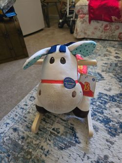 Ride-on pony with comfy seat, hardwood handles and rockers
