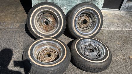 Mismatched 14 Inch wire wheels with old tires on Them, Good rollers