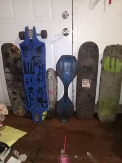 Bunch of different skateboards