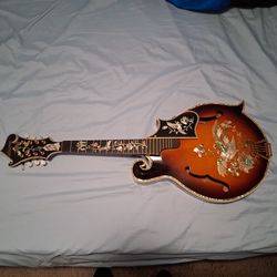 Abalone shell mandolin . No strings with a case.   Excellent  shape
