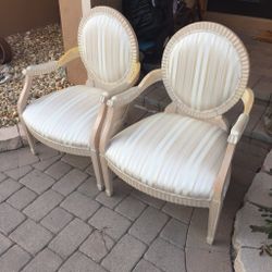 Pair of armed chairs