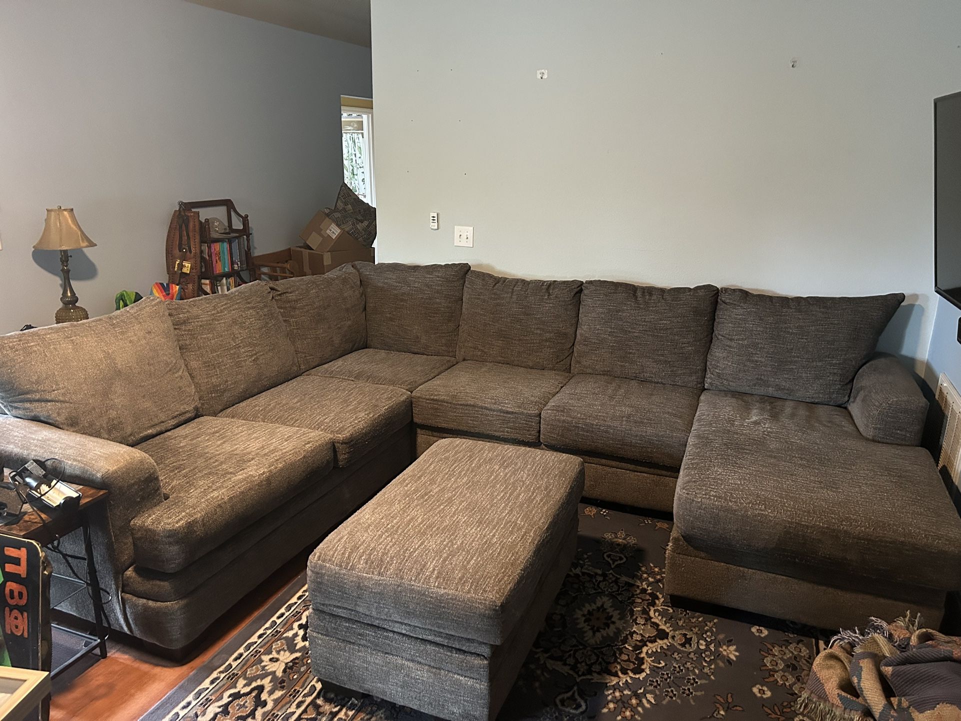Large Gray Sectional With Storage Ottoman